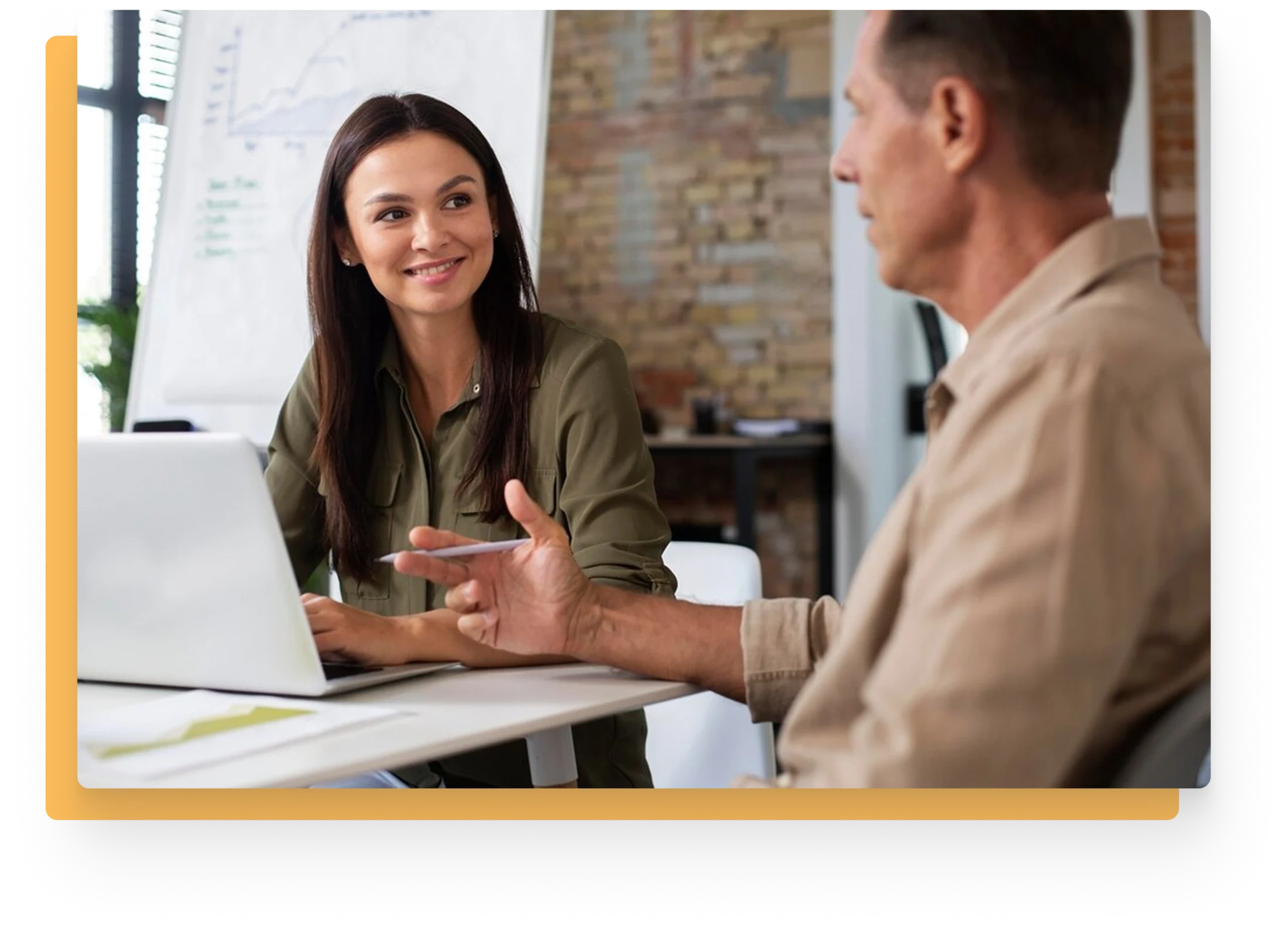 HR consultant and client having a positive discussion in a modern office setting